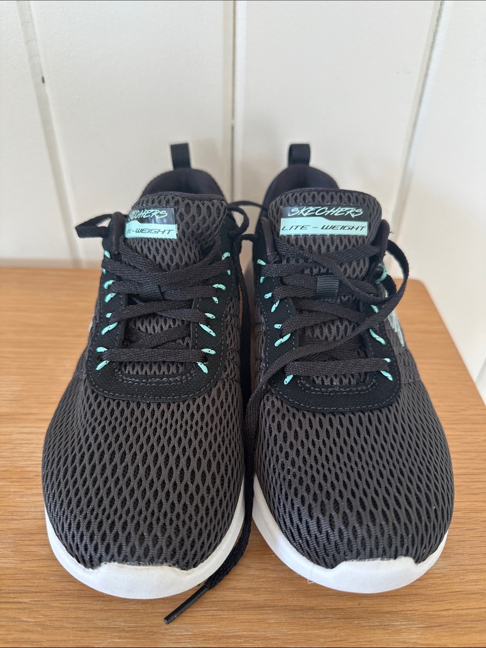 Skechers Women’s Black Sneakers with Teal Accents